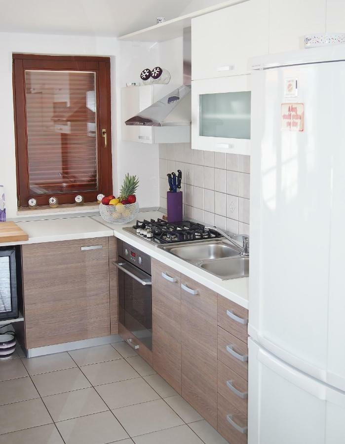Apartmani Porat Malinska Buitenkant foto